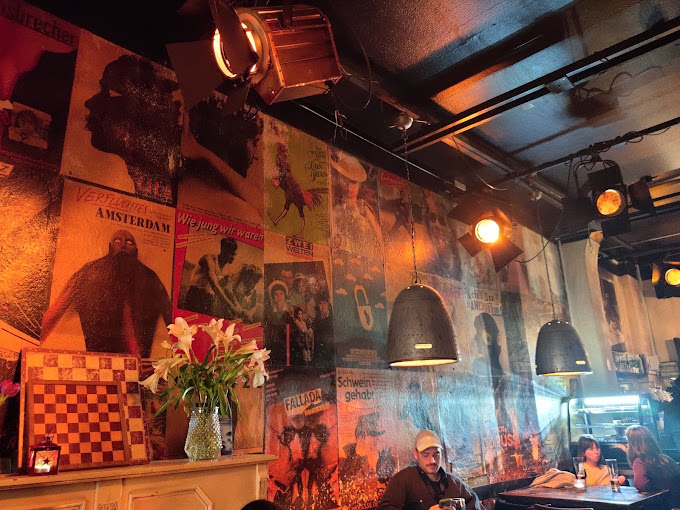 Cozy Café Cinema in Berlin with creative wall design and cult flair, a truly crazy restaurant in Berlin.