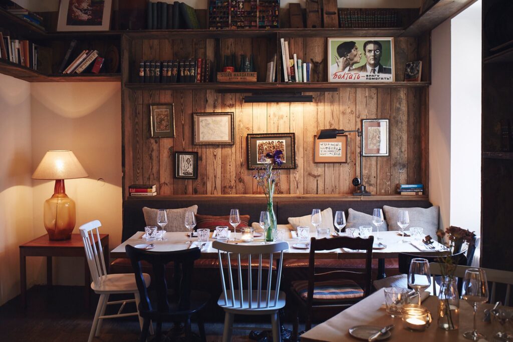 Cozy interior of Katz Orange – one of Berlin's crazy restaurants with a creative concept and unique atmosphere.